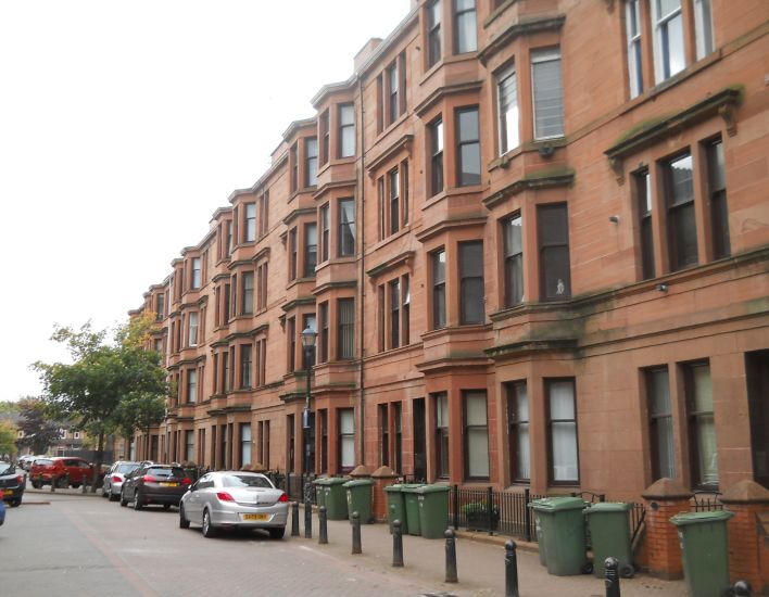 Traditional red sandstone tenement buildings in Govan District of Glasgow